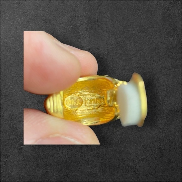 Kenneth Jay Lane Gold Tiger Stripe Half Hoop Enamel Clip
Earrings - Picture 9 of 12